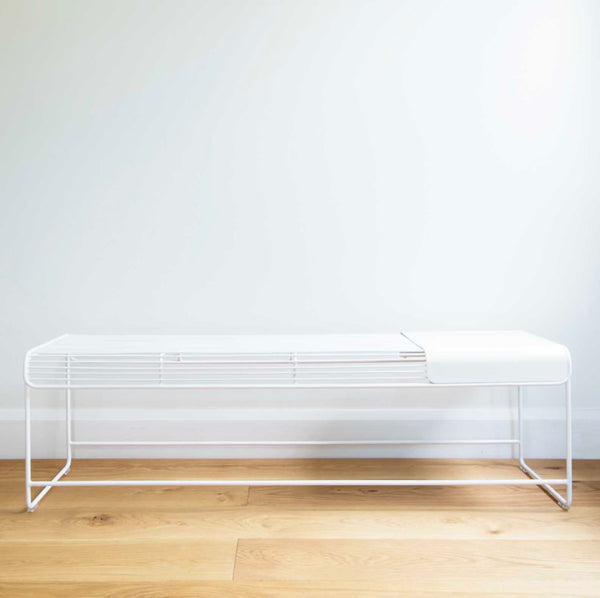 The Benmore Bench caters to both function and style, with a moveable metal plate that can be used for seating, organising and placing loose items.