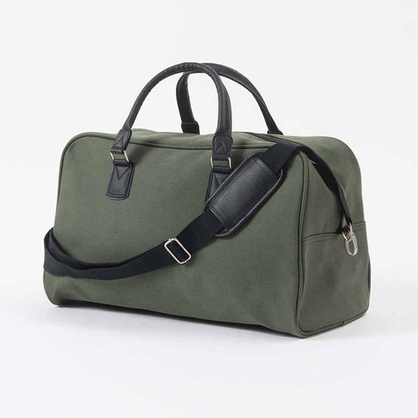 This Canvas Bag is a travel essential, it's a compact, structured design featuring robust handles and a comfy shoulder strap.
