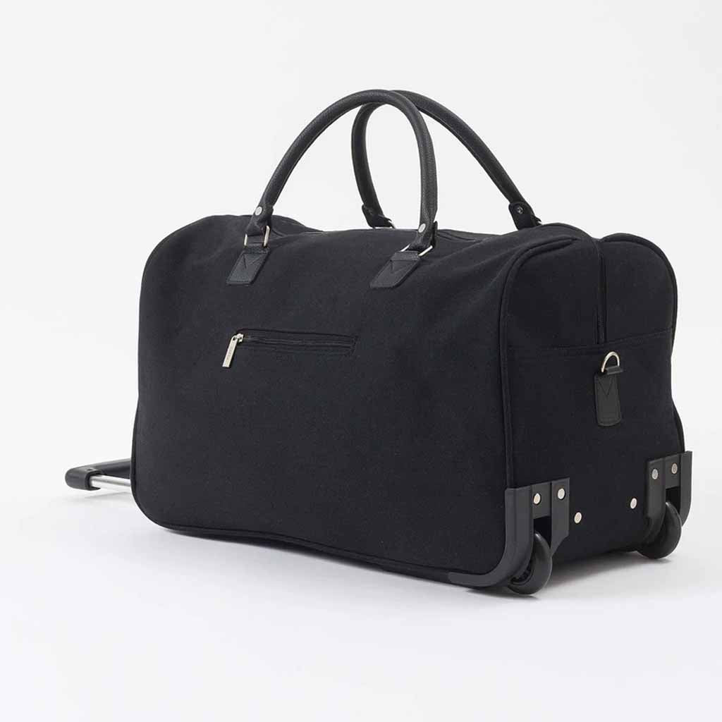 The practical Canvas Trolley Bag features an extendable handle, durable design and overhead locker friendly dimensions.