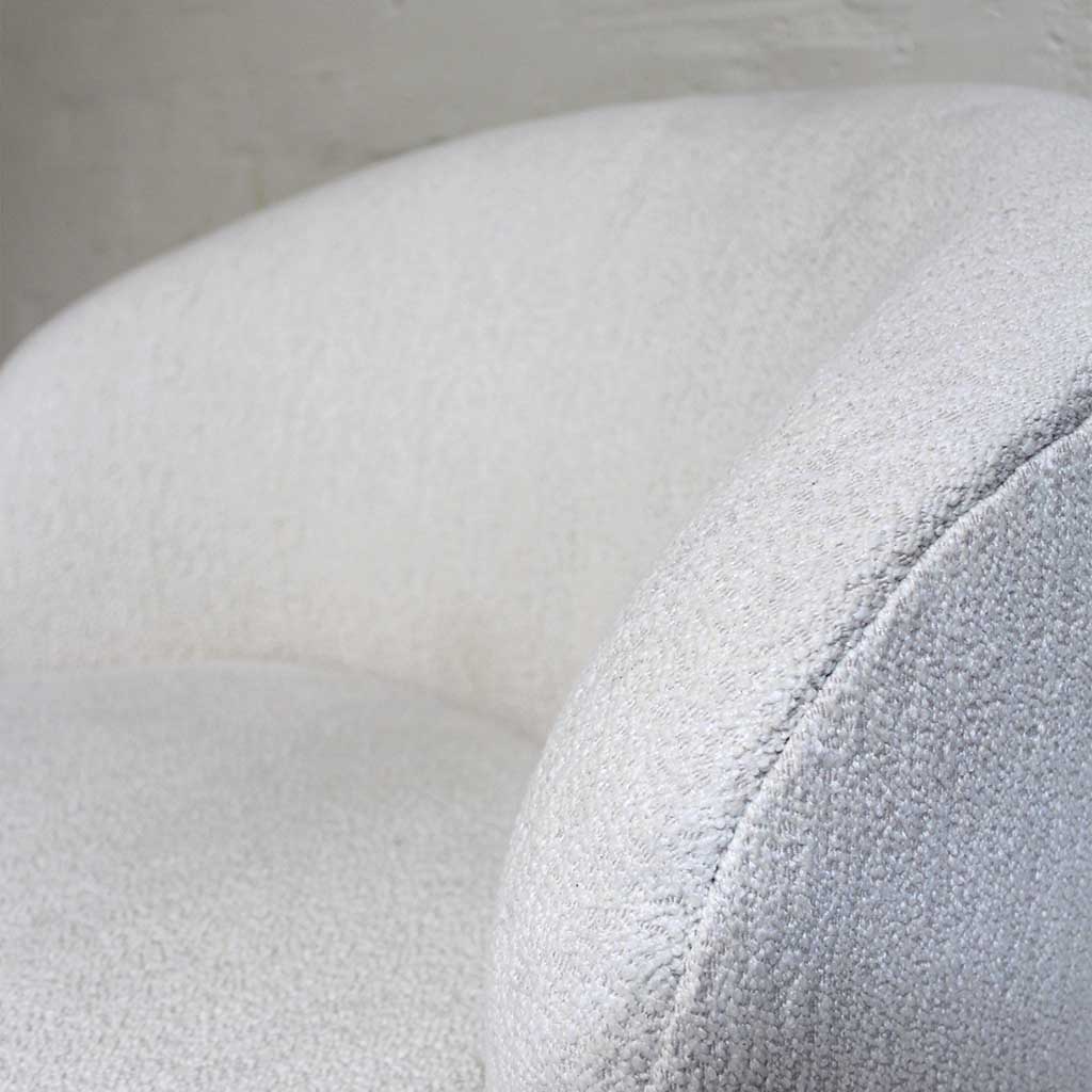 The Albie Swivel Chair with its sleek curves and plush cushioning is compact and stylish. Ivory boucle offers subtle texture, complementing the minimalist bedroom or living space. Pairs perfectly with the Albie Ottoman or standalone.