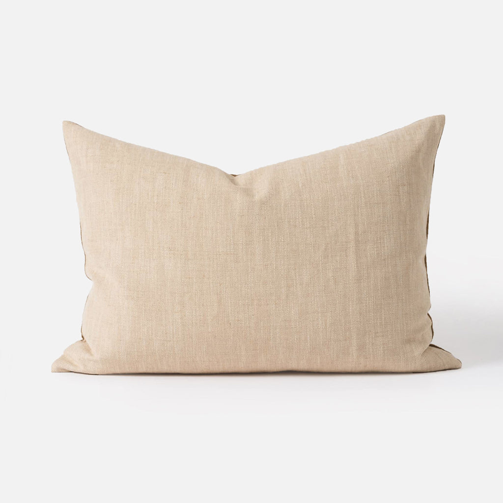 The Amano Cushion Cover is a delightfully reversable two-toned piece that celebrates warming tones and abundant texture.