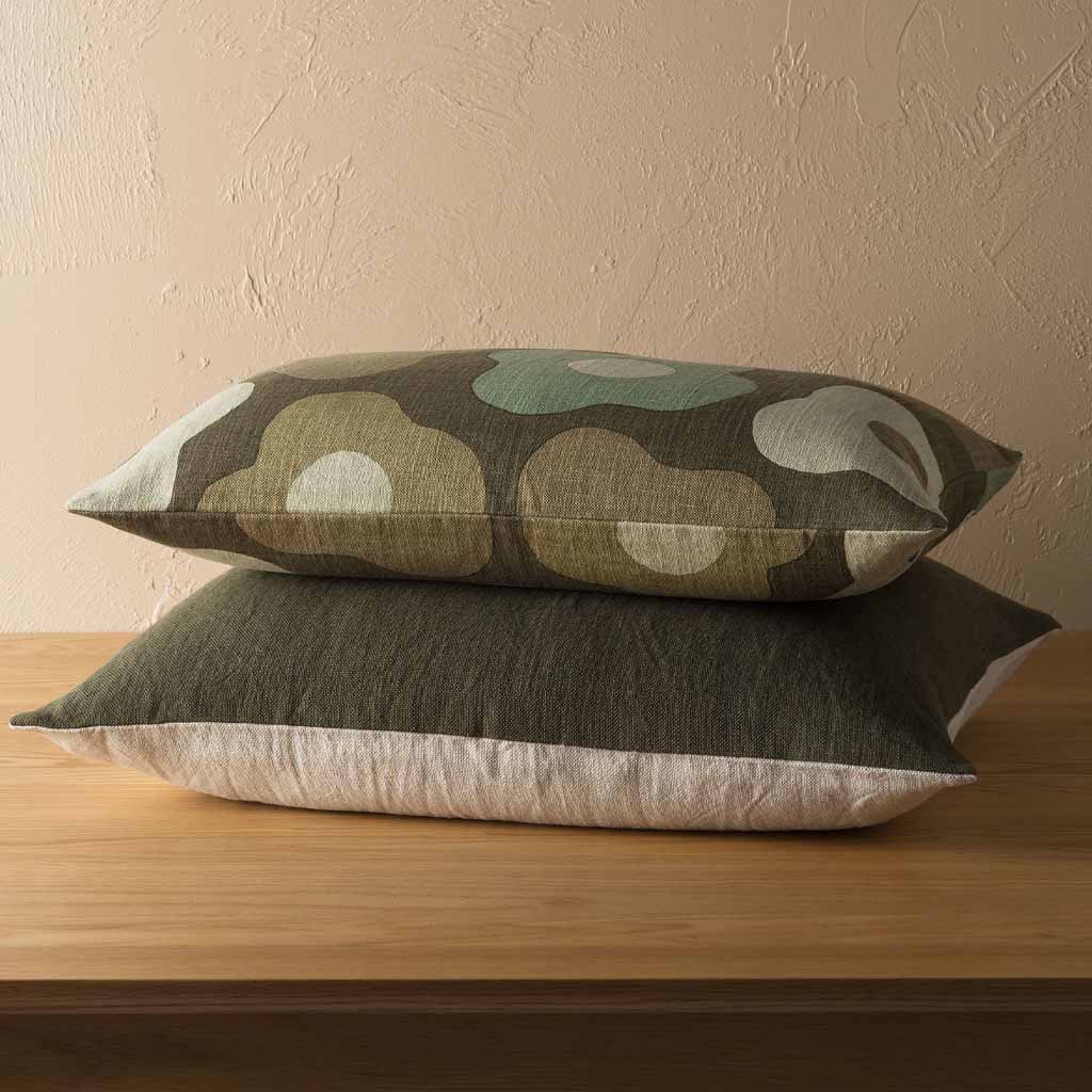 The Amano Cushion Cover is a delightfully reversable two-toned piece that celebrates warming tones and abundant texture.