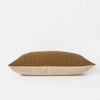The Amano Cushion Cover is a delightfully reversable two-toned piece that celebrates warming tones and abundant texture.