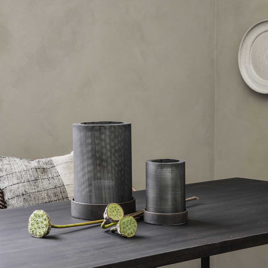 These lanterns will set the mood and create a soft warmth in the minimalist or modern space. The combination of steel and ceramic offers a refined industrial look whilst still creating a beautiful soft light.