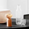 The Capsule carafe is made in Kristina Dams' Studio based in Copenhagen, Denmark. The unique "capsule" design leaves an air bubble in the middle of the glass - this serves both as a characteristic design feature and as a glass cork for the Carafe. Handmade, please expect small differences in shape. 