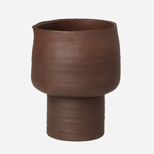 Our Axil Vase carries a beautiful silhouette in shape. Available in Red Clay colour, it is simple but very versatile.